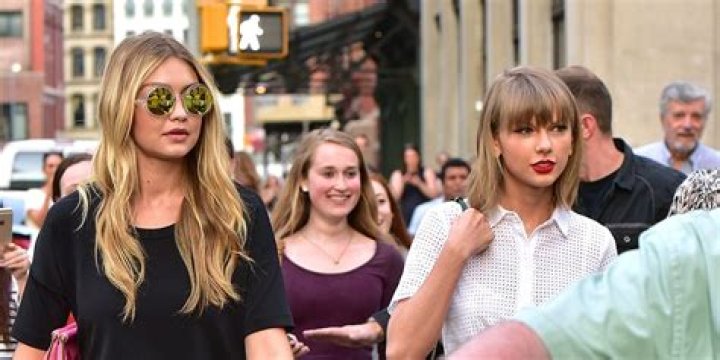 Taylor Swift and Gigi Hadid and friends Martha Hunt, Haim sisters (not pictured here) go on a girl's day out as they were seen exiting Swift's Tribeca apartment in New York City. Swift wore her a shirt with her cats printed and also a skirt short. Pictured: Taylor Swift,Gigi Hadid Ref: SPL5009753 130718 NON-EXCLUSIVE Picture by: Edward Opi / SplashNews.com Splash News and Pictures Los Angeles: 310-821-2666 New York: 212-619-2666 London: 0207 644 7656 Milan: +39 02 4399 8577 Sydney: +61 02 9240 7700 World Rights, No Portugal Rights