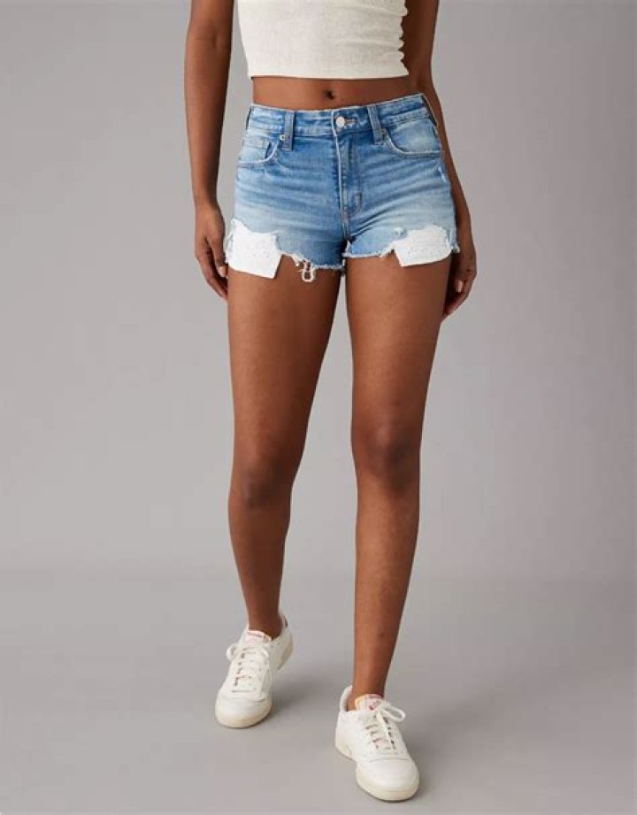 Tayshia Adams In HIgh-Waisted Shorts