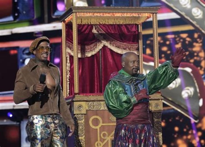 ‘The Masked Singer’ Recap: A Famous Talk Show Host Is Revealed As The Lips & She Flirts With Nick Cannon