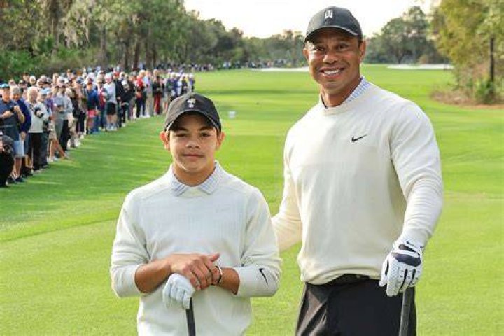 Tiger Woods, right with his daughter Sam Alexis Woods, left, and his girlfriend Erica Herman, center, walk along the Colonnade following a ceremony where President Donald Trump awarded the Presidential Medal of Freedom to Tiger Woods at the White House in Washington, Monday, May 6, 2019. (AP Photo/Manuel Balce Ceneta)