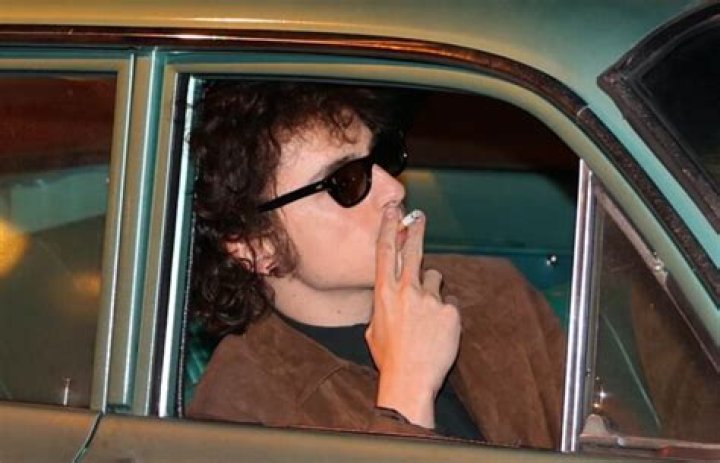Timothee Chalamet Smokes a Cigarette on the Set of Bob Dylan Movie in New Video