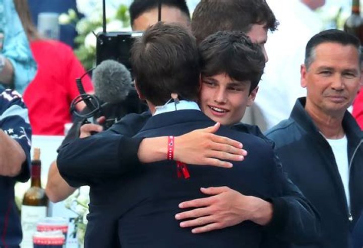 Tom Brady hugs son Jack after the Super Bowl