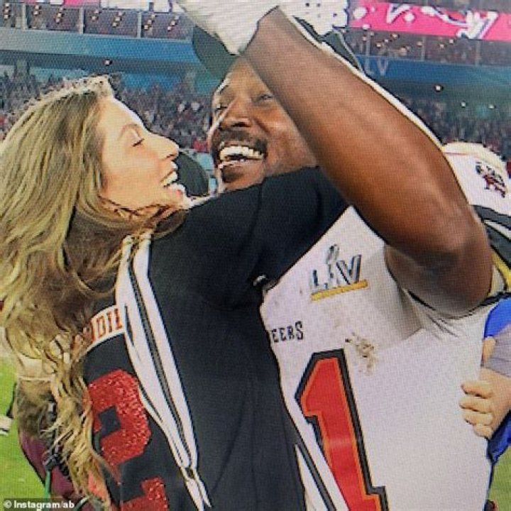 Tom Brady hugs wife Gisele Bundchen after the Super Bowl