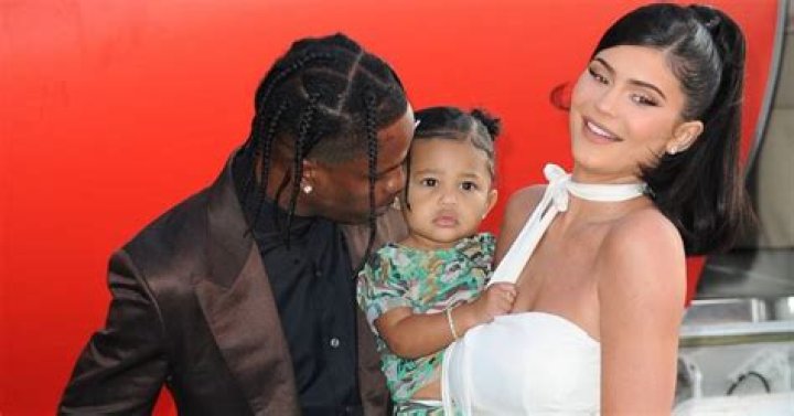 Travis Scott Holds Stormi Webster