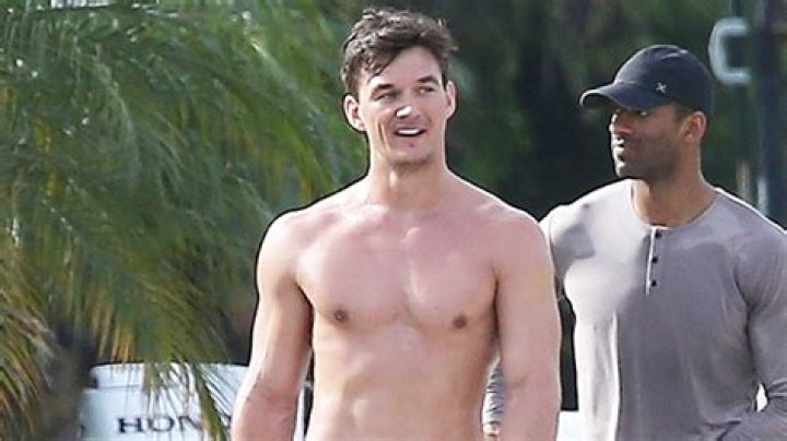 Tyler Cameron Shows Off His Ripped Abs While Skimboarding After Hanging Out With Hot Model
