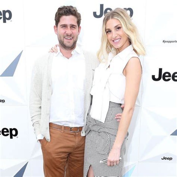 Whitney Port poses with husband, Tim and 2 year old son, Sonny