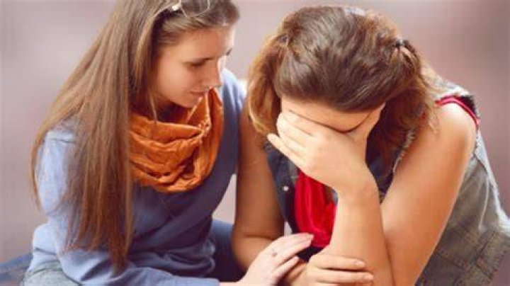 Witnesses comfort one another in Dayton, Ohio