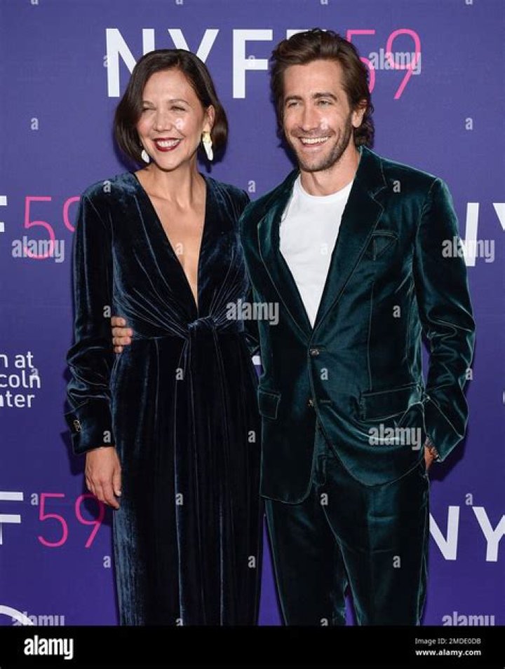 Writer-director Maggie Gyllenhaal, left, brother Jake Gyllenhaal and Jake's girlfriend Jeanne Cadieu pose together at a special screening of "The Lost Daughter" at Alice Tully Hall during the 59th New York Film Festival on 2021 NYFF - "The Lost Daughter" Screening, New York, United States - 29 Sep 2021