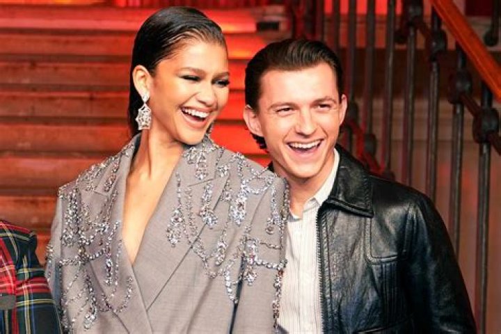 Zendaya Rocks White Suit As She Leaves ‘Spider-Man’ Premiere After-Party With Tom Holland